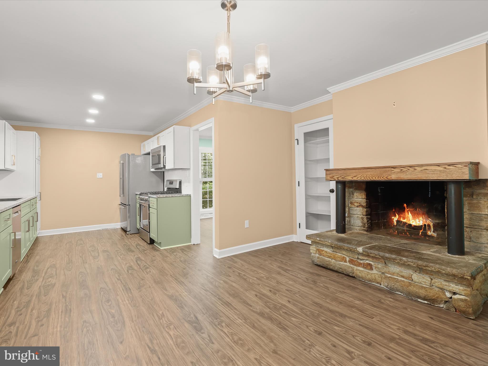 201 Suter Road Catonsville, MD 21228 - Photo 14 of 45 Rustic stone fireplace & accent molding