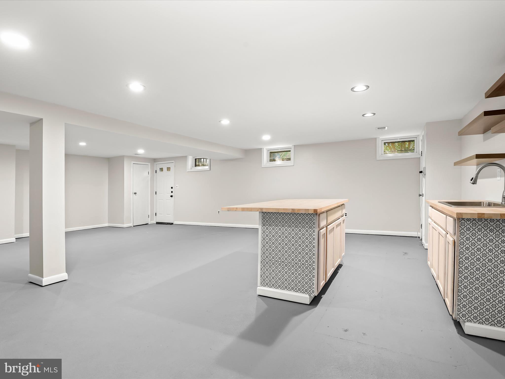 201 Suter Road Catonsville, MD 21228 - Photo 29 of 45 Lower level rec room w/ walkup stairs