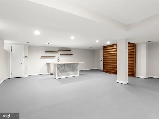 a utility room with washer and dryer