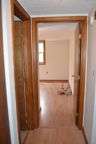 an empty room with closet area