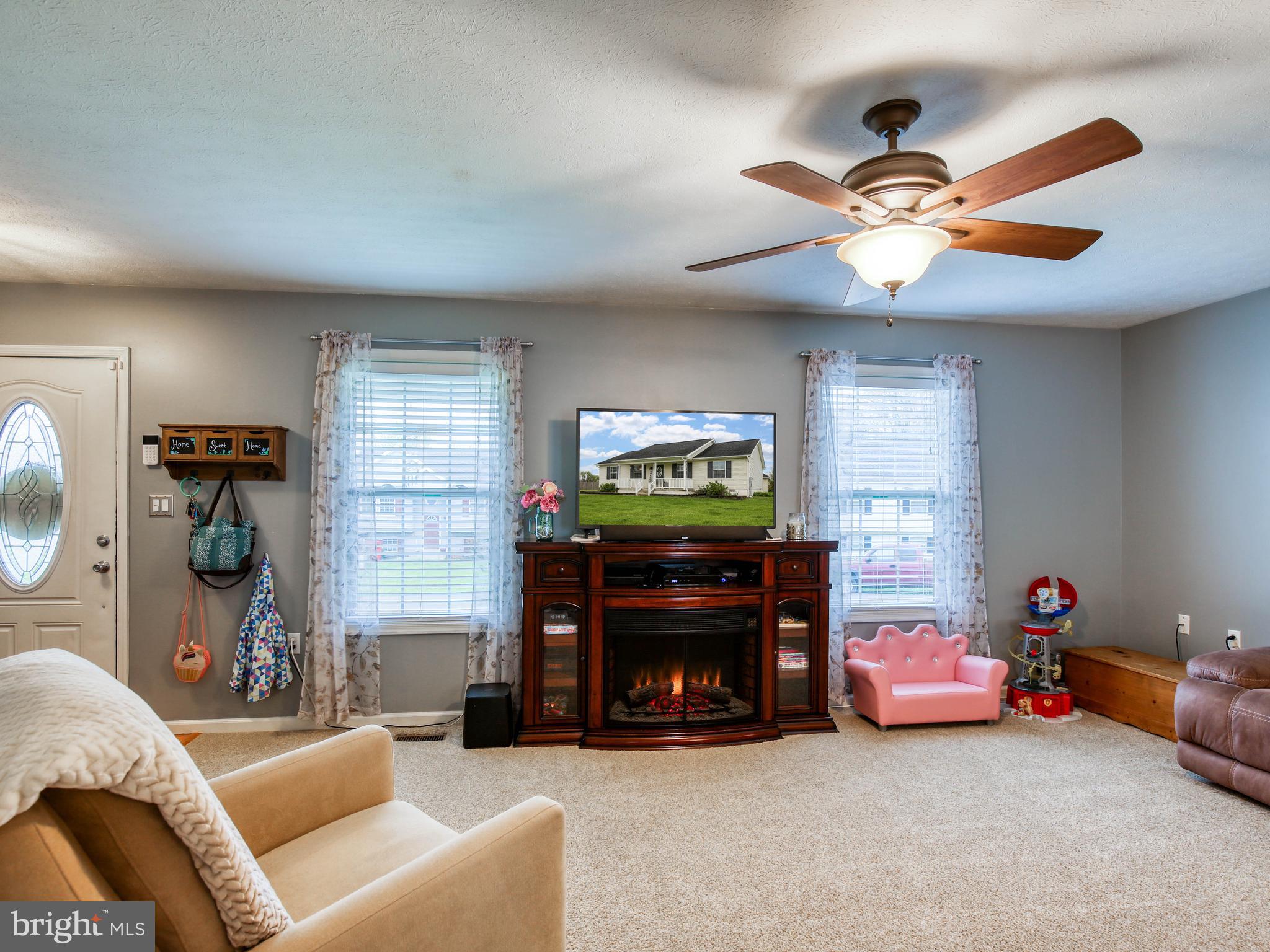 107 Michelle Drive Ranson, WV 25438 - Photo 12 of 31 Blinds and ceiling fan in Living Room