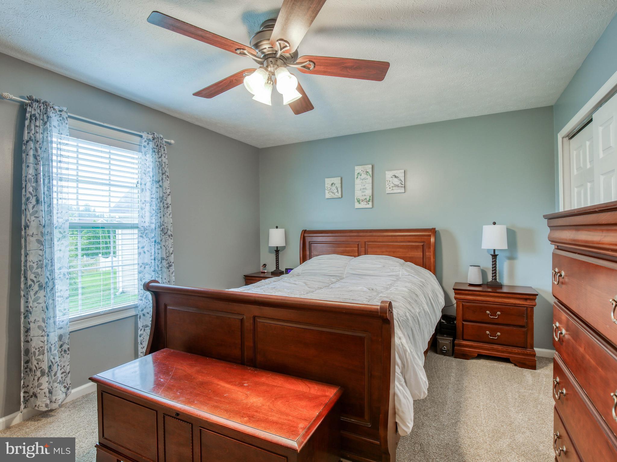 107 Michelle Drive Ranson, WV 25438 - Photo 23 of 31 Master Bedroom w/ceiling fan and blinds