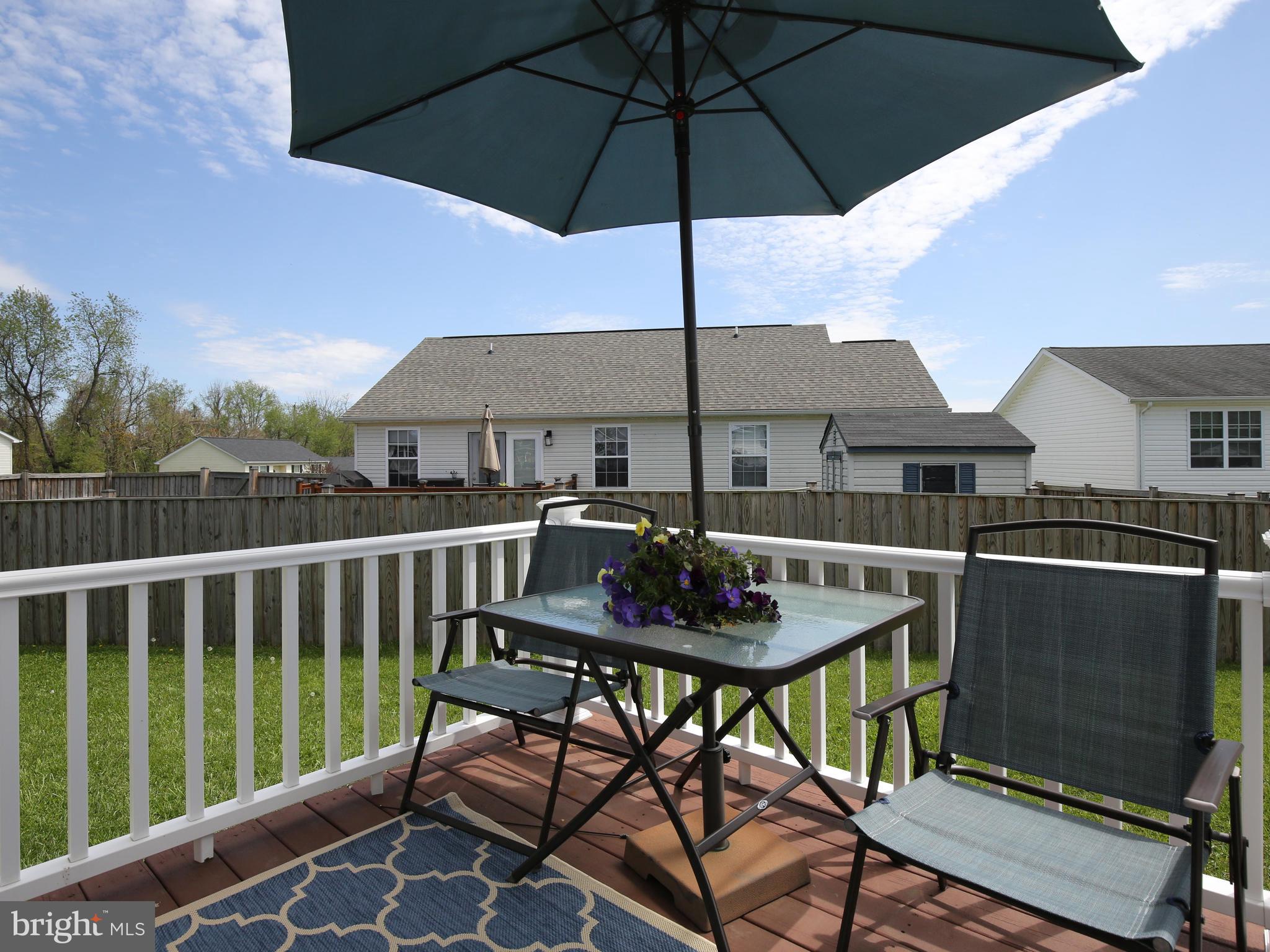 107 Michelle Drive Ranson, WV 25438 - Photo 5 of 31 Deck leads to back yard