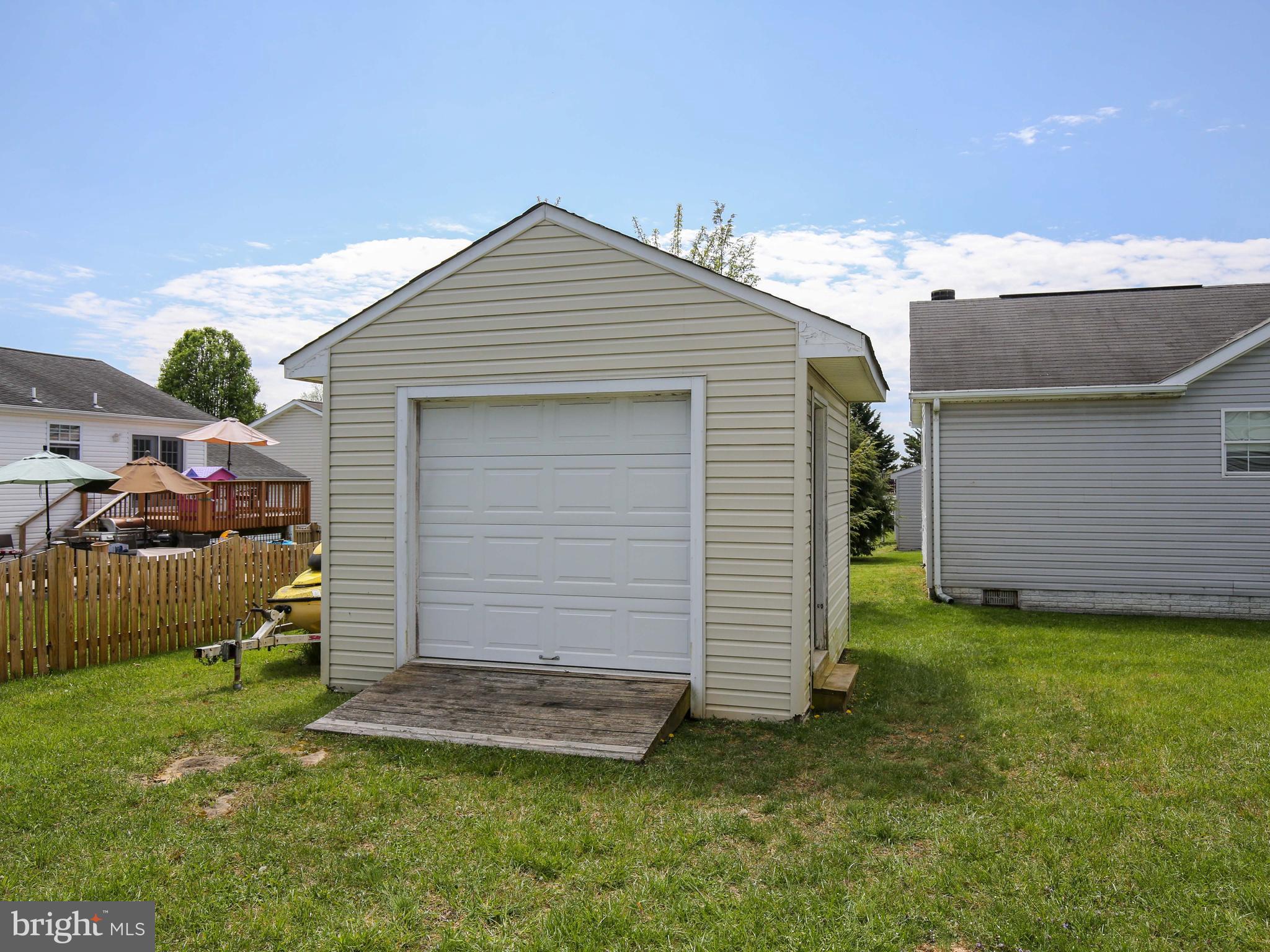 107 Michelle Drive Ranson, WV 25438 - Photo 8 of 31 Shed w/ garage door easy access & lots of storage