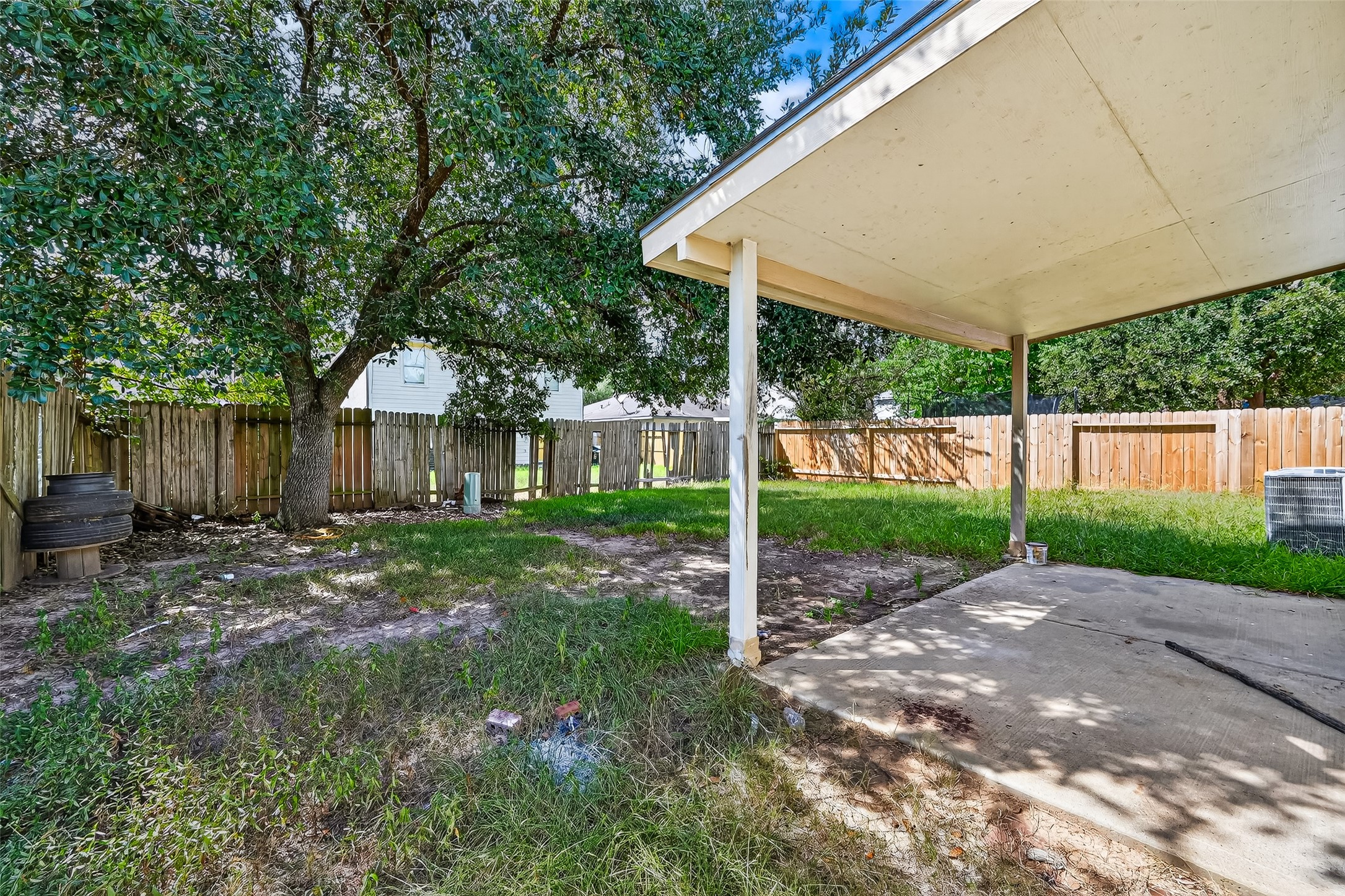 22819 Cabanna Road Spring, TX 77389 - Photo 25 of 26 a view of a house with backyard and a tree