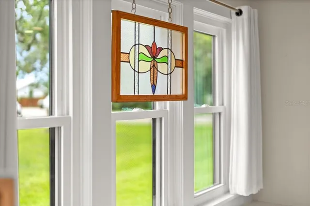 a living room with fireplace furniture and a wooden floor