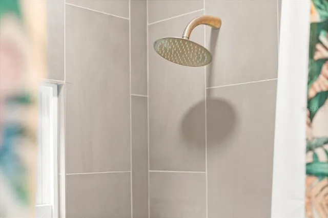 a view of a porch with furniture and yard