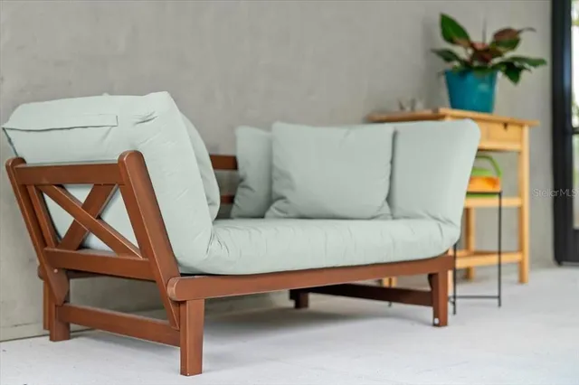 a view of a swimming pool with a chair