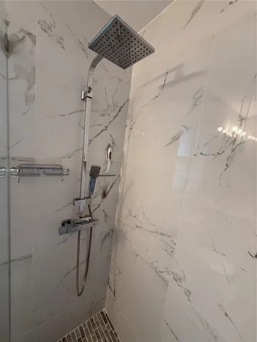 a view of a living room and dining room