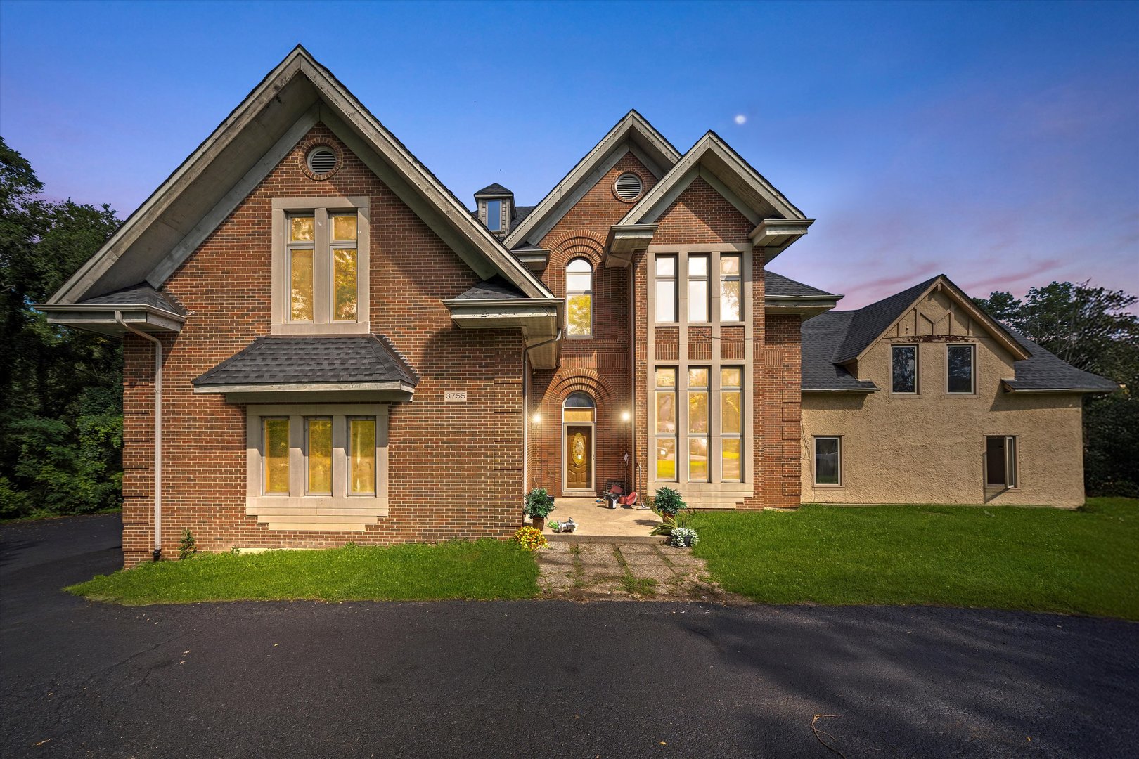 3755 South State Street Crete, IL 60417 - Photo 1 of 48 a front view of a house with a yard and garage