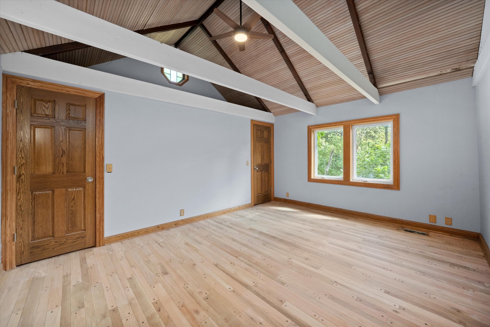 3755 South State Street Crete, IL 60417 - Photo 23 of 48 a view of an empty room with wooden floor and a window