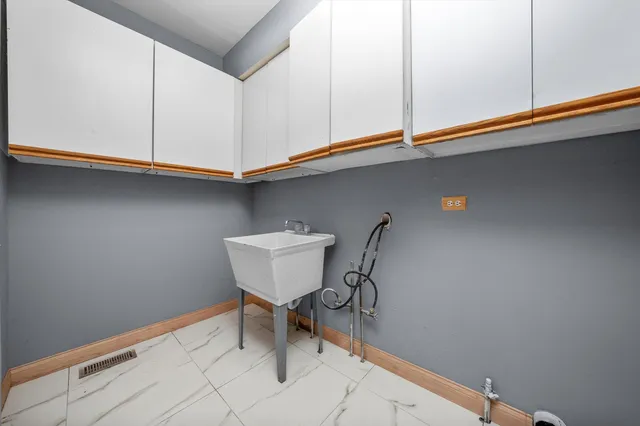 a view of a room with rack on the wall