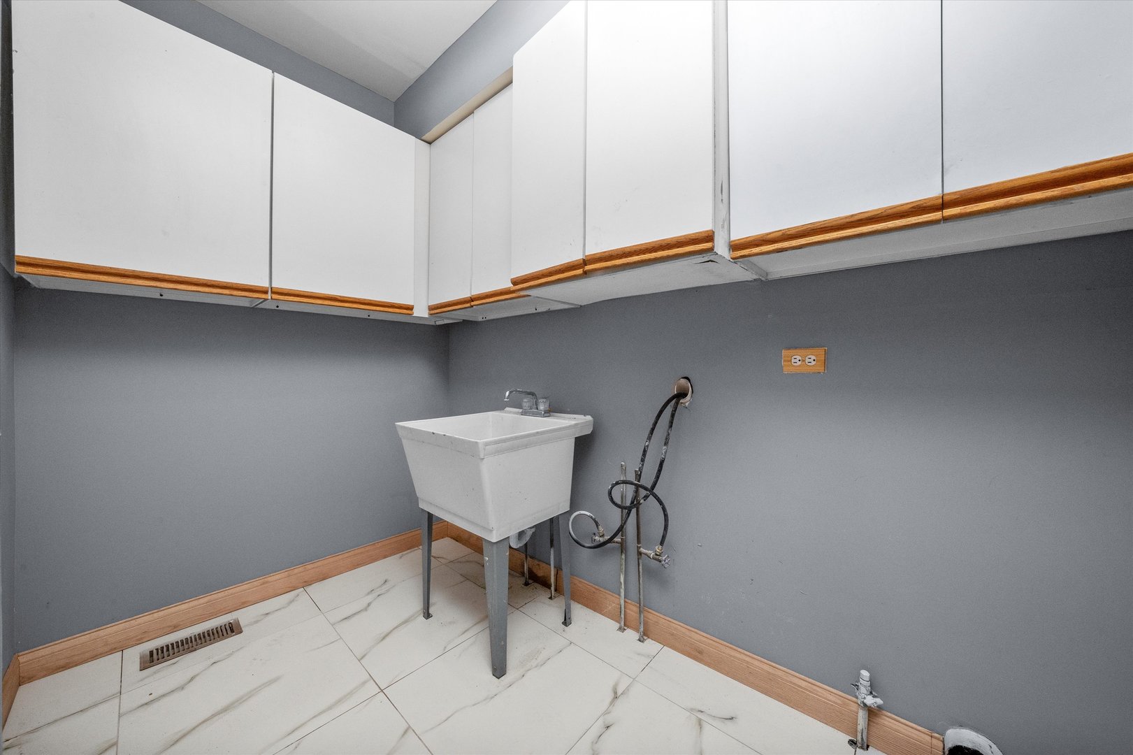 3755 South State Street Crete, IL 60417 - Photo 28 of 48 a view of a room with rack on the wall