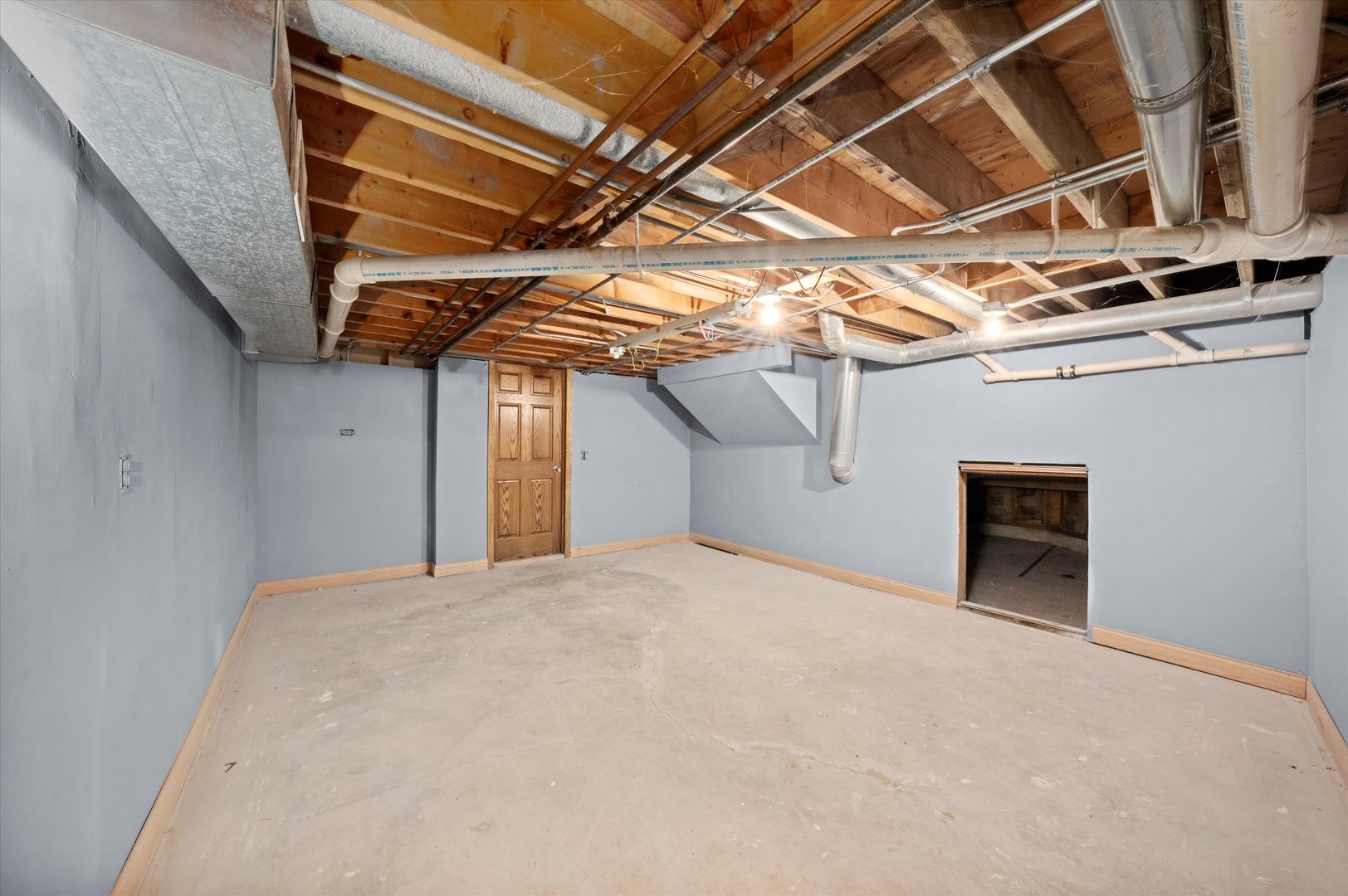 3755 South State Street Crete, IL 60417 - Photo 30 of 48 a view of a room with wooden walls