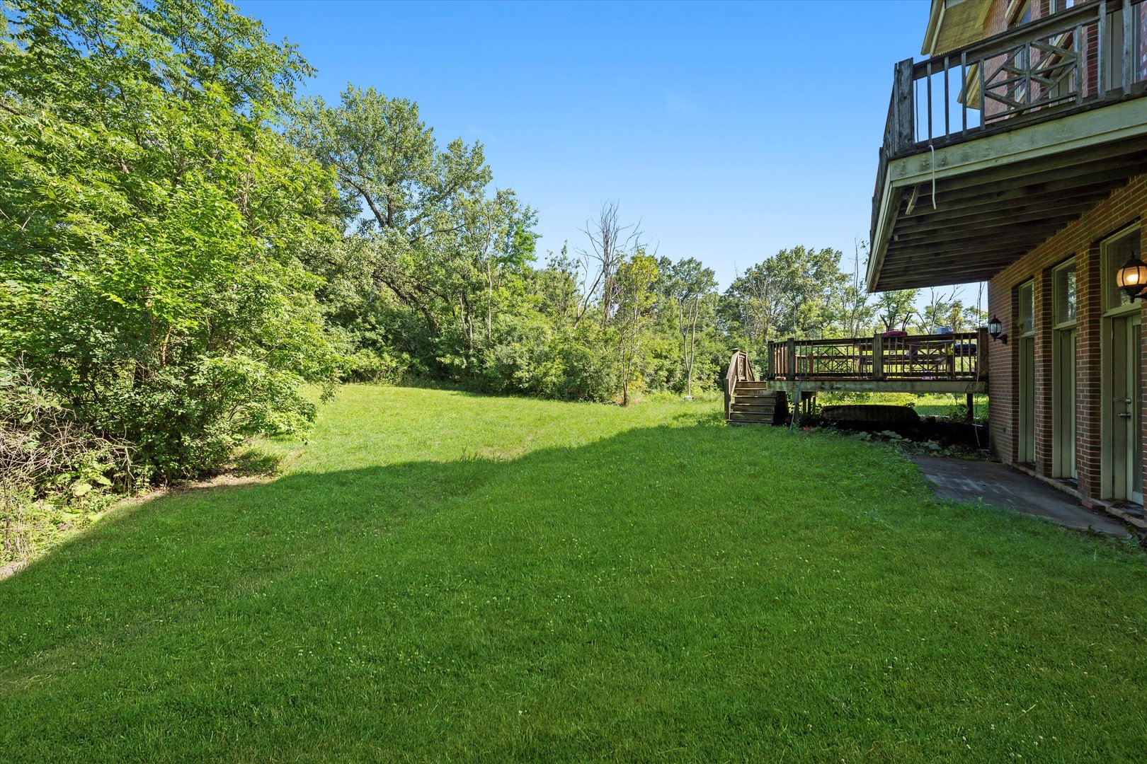 3755 South State Street Crete, IL 60417 - Photo 35 of 48 a view of a house with a backyard