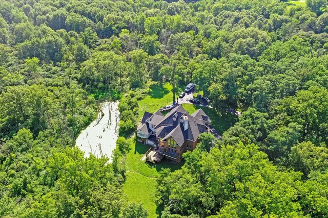 a picture of a bathroom with a shower