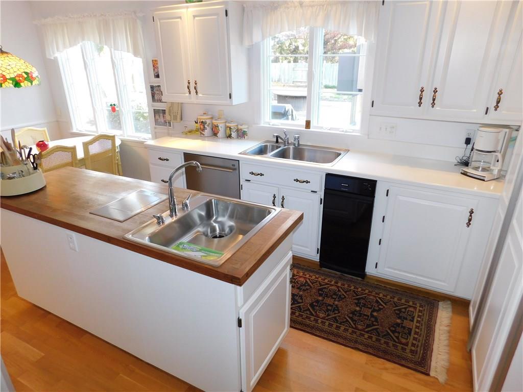 286 Donation Road Greenville, PA 16125 - Photo 12 of 25 BRIGHT WHITE KITCHEN WITH CENTER ISLAND