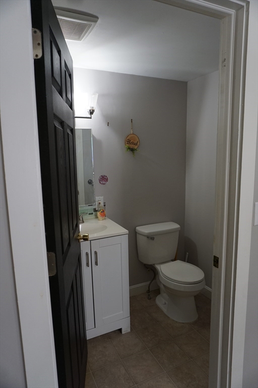 5-7 Summer Street Maynard, MA 01754 - Photo 20 of 28 a bathroom with a sink toilet and shower