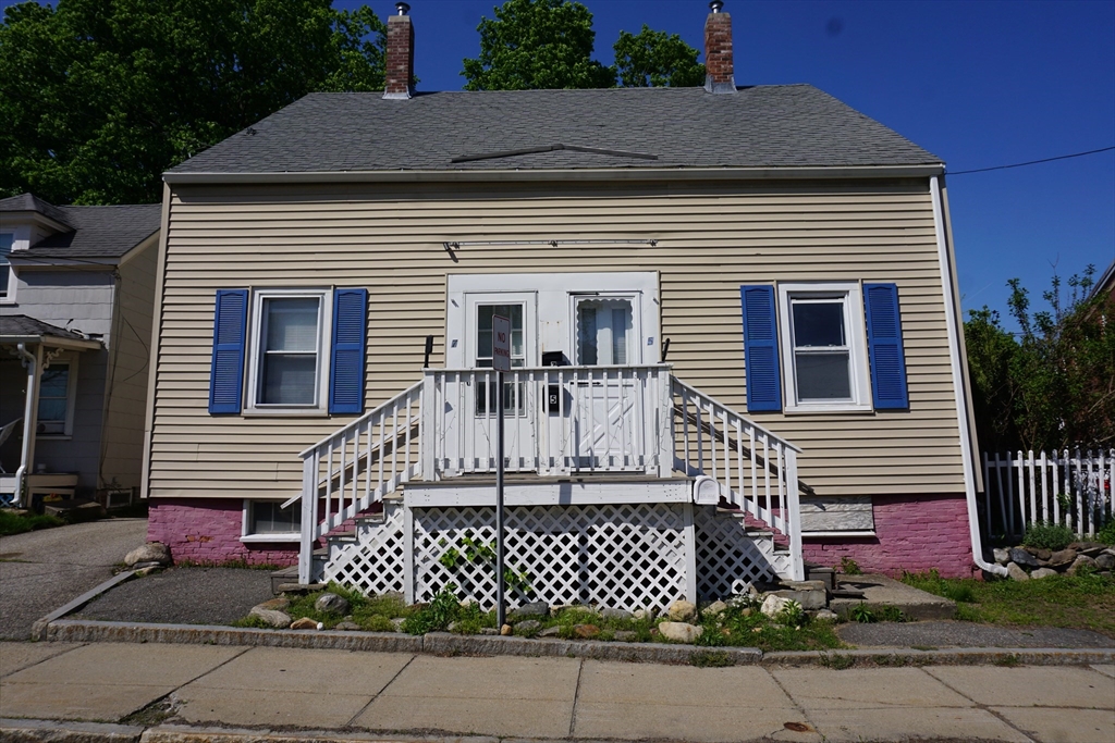 5-7 Summer Street Maynard, MA 01754 - Photo 2 of 28 a front view of a house