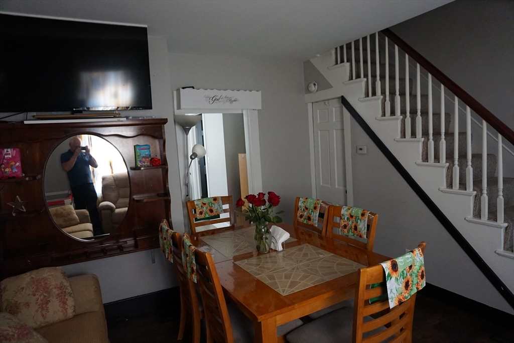 5-7 Summer Street Maynard, MA 01754 - Photo 25 of 28 a dining room with furniture and wooden floor