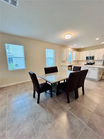 a room with furniture and a window