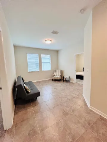 a bedroom with a bed and a cabinets