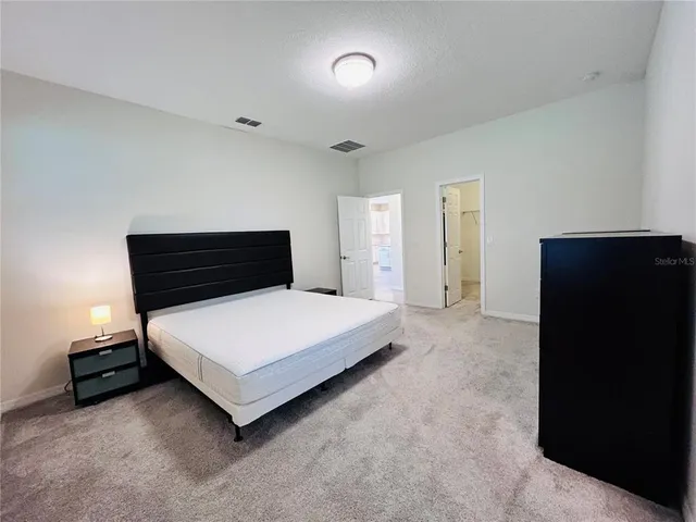 a view of a room with a staircase