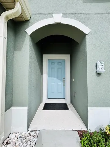 a small white building with a outdoor space