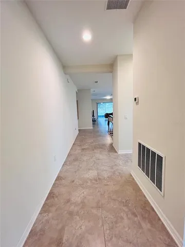 a utility room with a window a washer and dryer