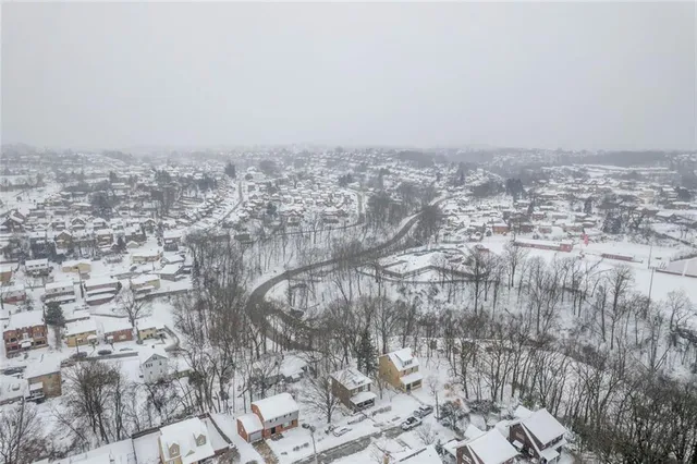 an aerial view of multiple house