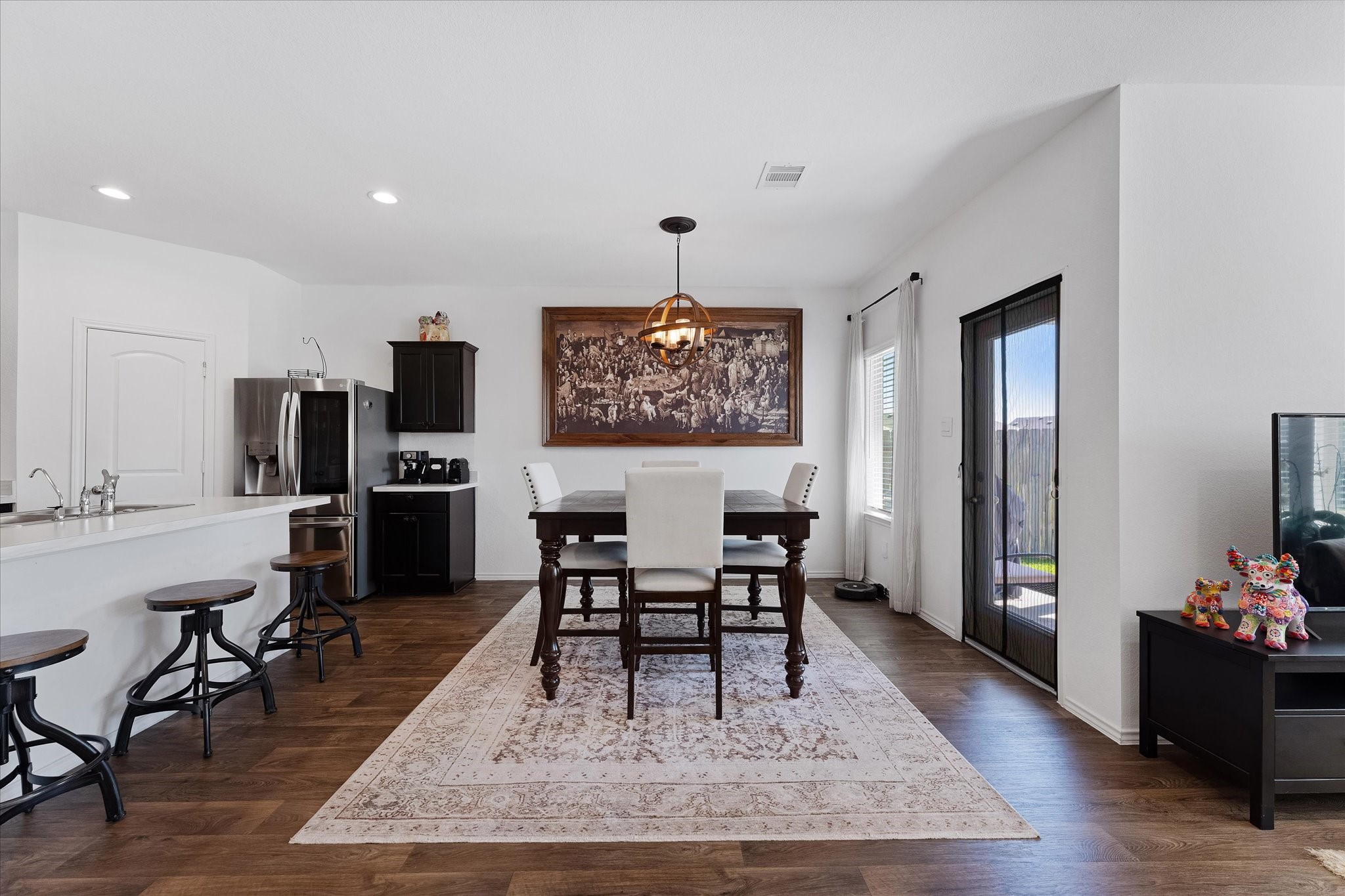 21511 Violet Rdg Road Katy, TX 77449 - Photo 15 of 27 a living room with furniture a rug and a flat screen tv