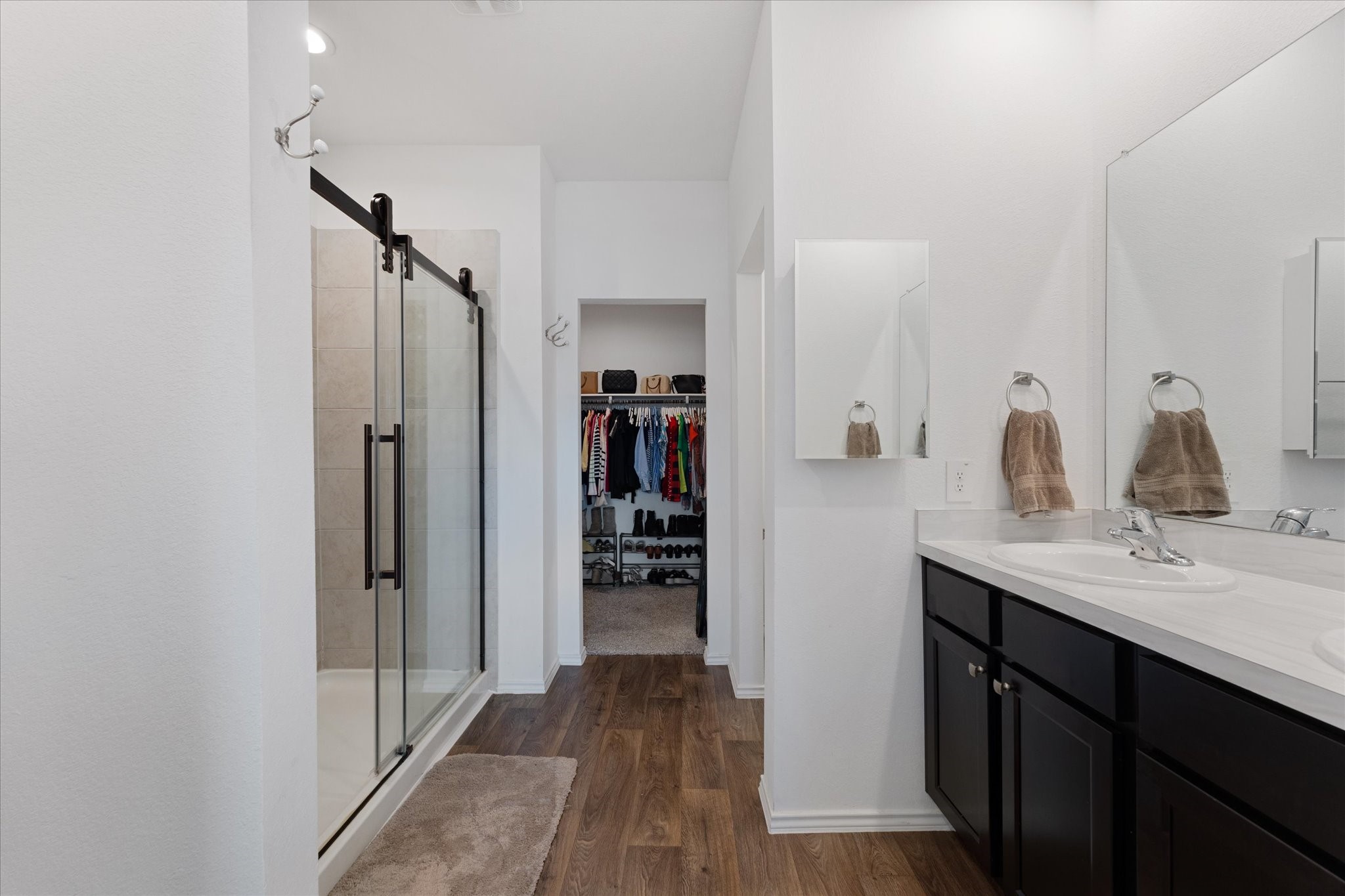 21511 Violet Rdg Road Katy, TX 77449 - Photo 17 of 27 a bathroom with a sink and a mirror