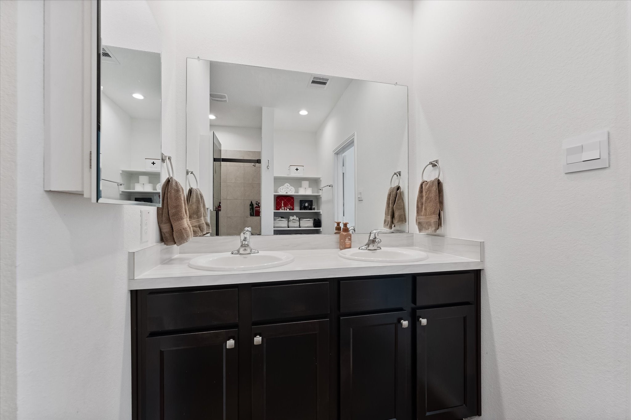 21511 Violet Rdg Road Katy, TX 77449 - Photo 19 of 27 a bathroom with a sink and a mirror