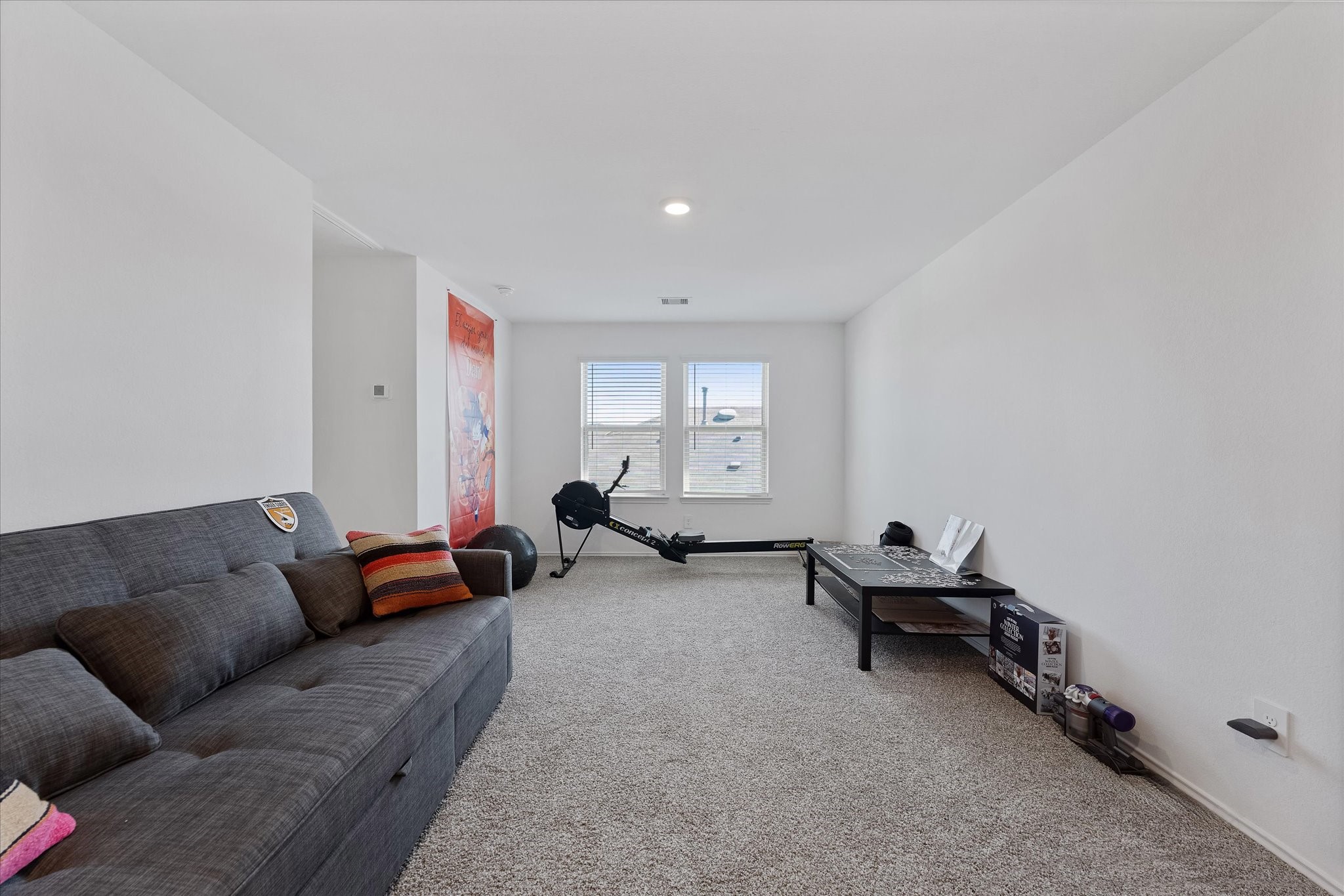21511 Violet Rdg Road Katy, TX 77449 - Photo 20 of 27 a living room with furniture and a couch