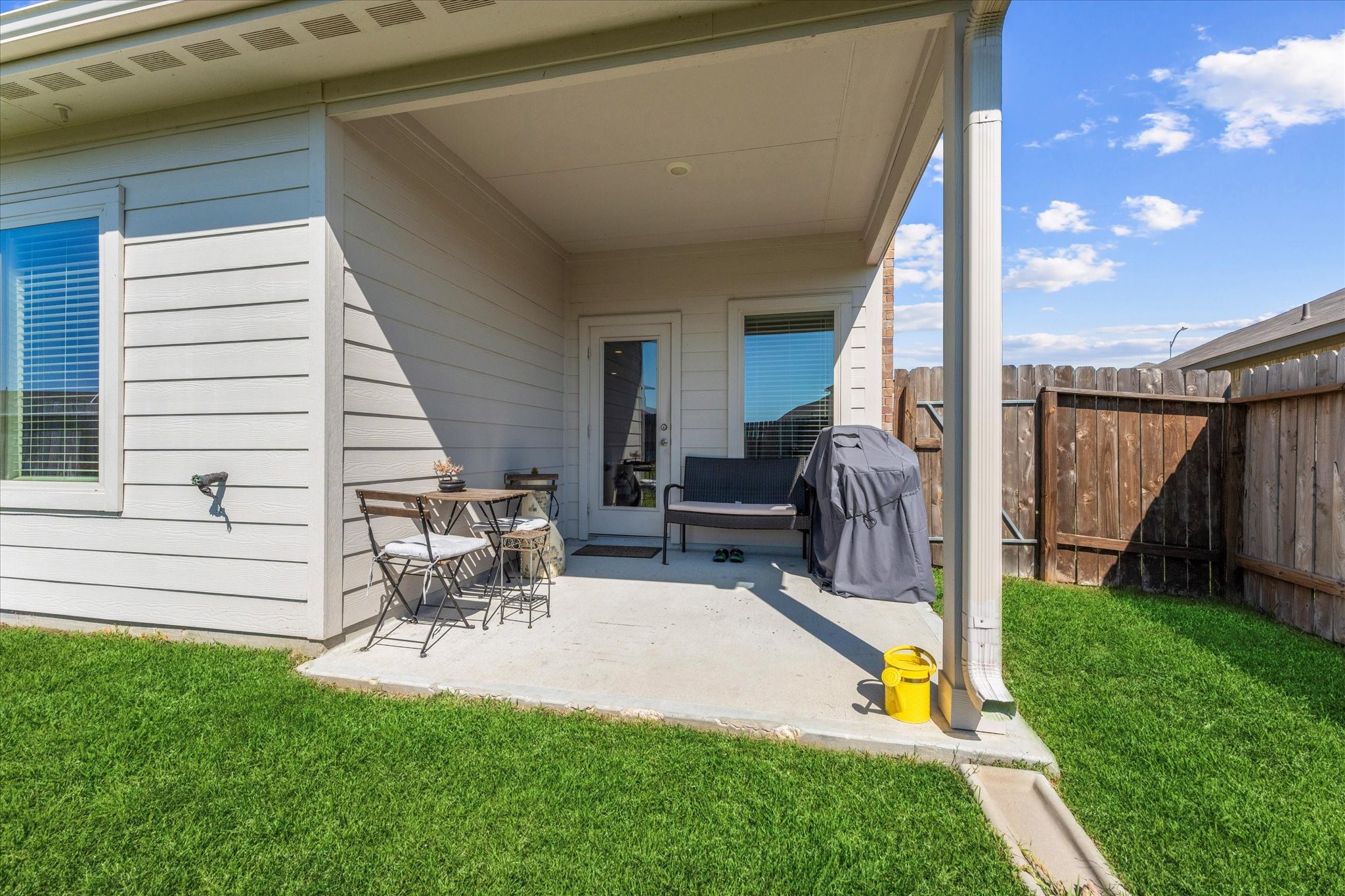 21511 Violet Rdg Road Katy, TX 77449 - Photo 24 of 27 a house view with a seating space and garden