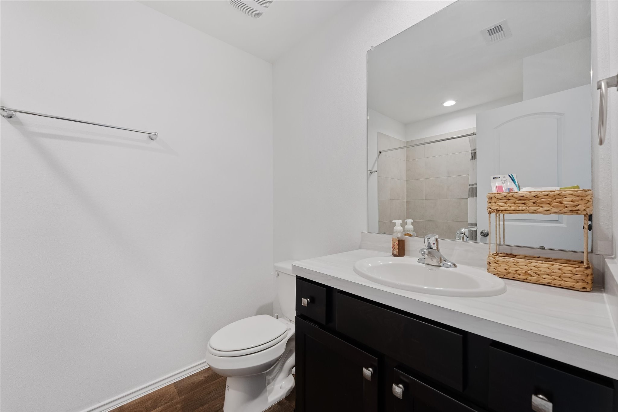 21511 Violet Rdg Road Katy, TX 77449 - Photo 5 of 27 a bathroom with a sink toilet and vanity