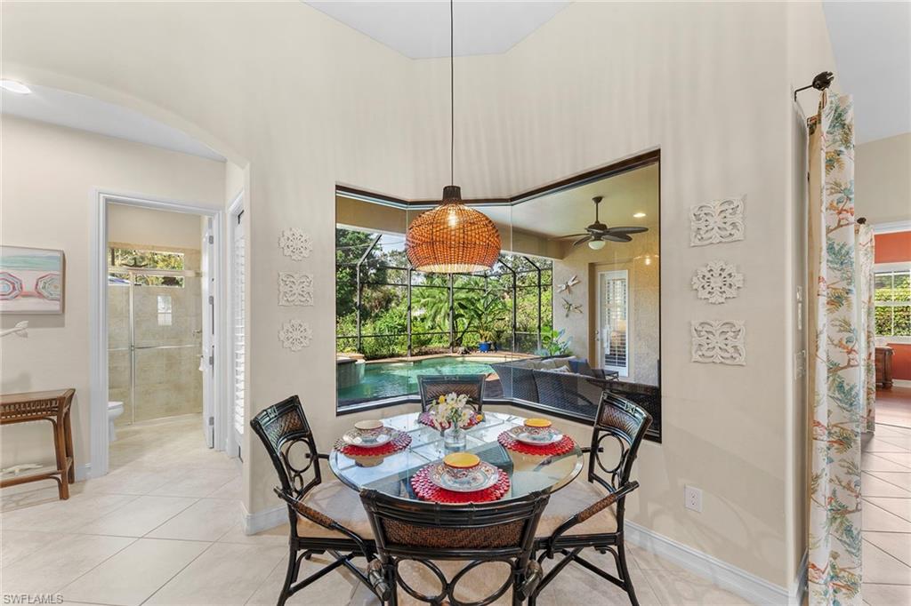 8838 Lely Island Circle Naples, FL 34113 - Photo 18 of 47 a outdoor space with furniture