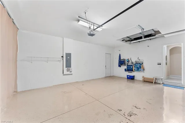 a view of a storage & utility room with two washing machine