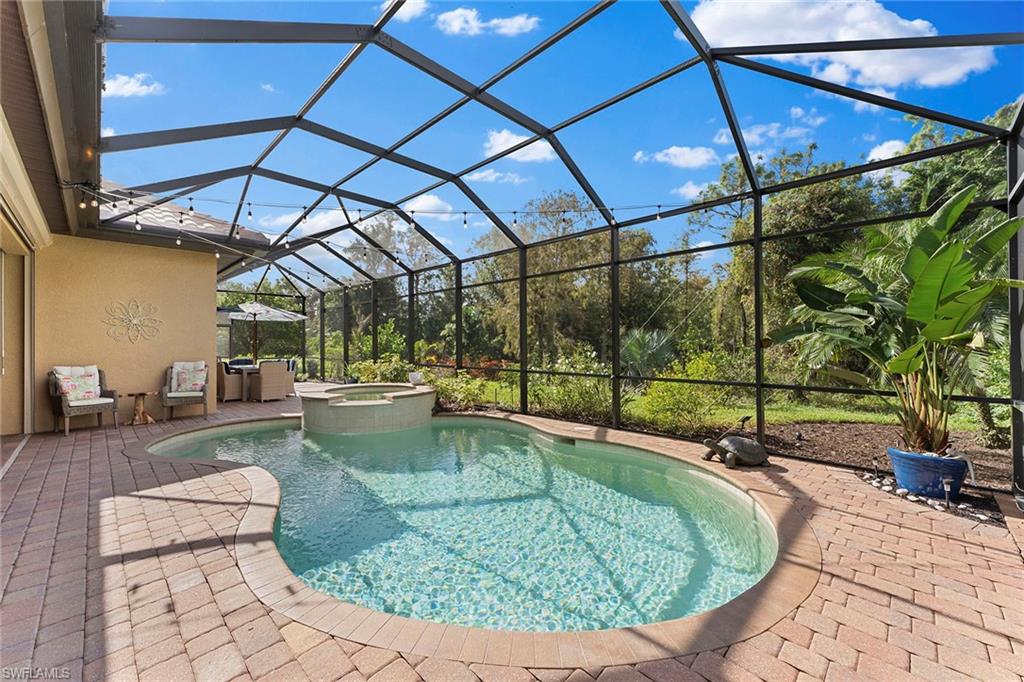 8838 Lely Island Circle Naples, FL 34113 - Photo 44 of 47 a view of a couches in patio
