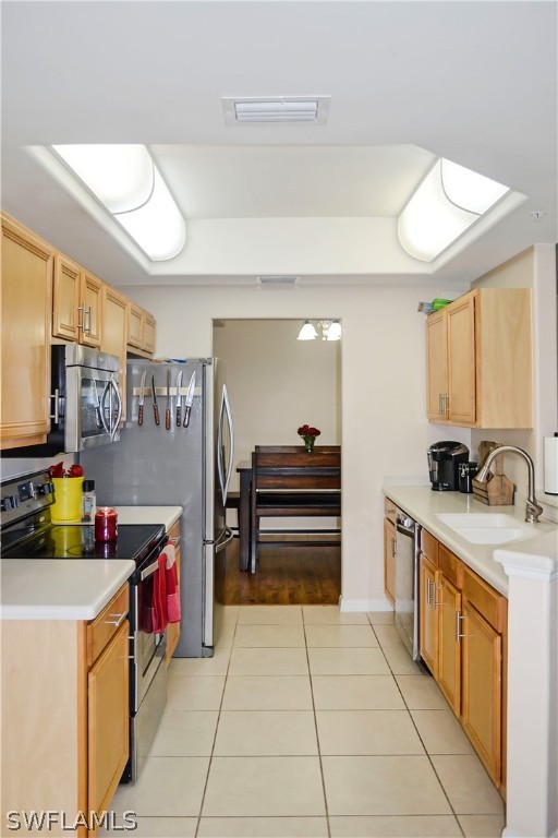 9048 Triangle Palms Lane, Unit 1106 Fort Myers, FL 33913 - Photo 11 of 29 a kitchen with a sink and cabinets