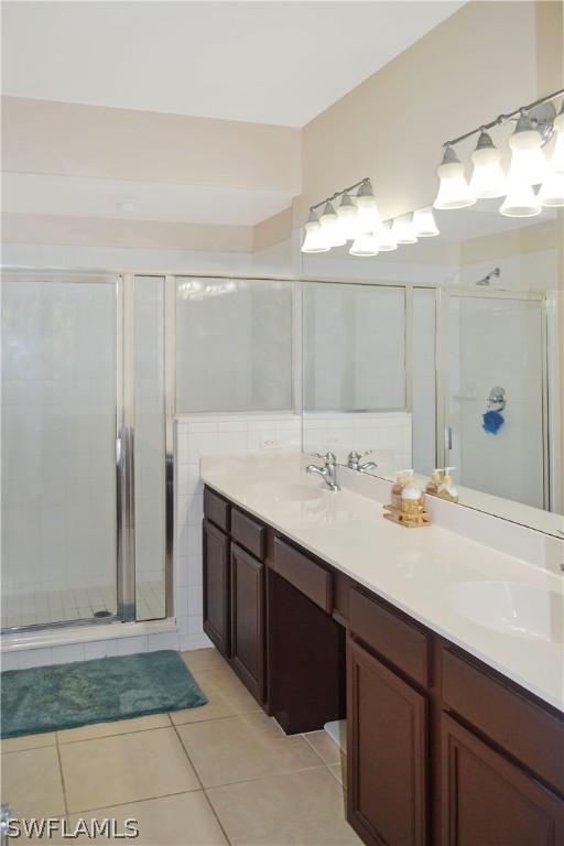 9048 Triangle Palms Lane, Unit 1106 Fort Myers, FL 33913 - Photo 15 of 29 a bathroom with a sink and a mirror