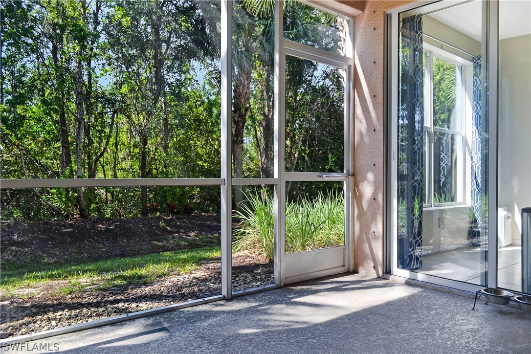 9048 Triangle Palms Lane, Unit 1106 Fort Myers, FL 33913 - Photo 23 of 29 a view of backyard with green space