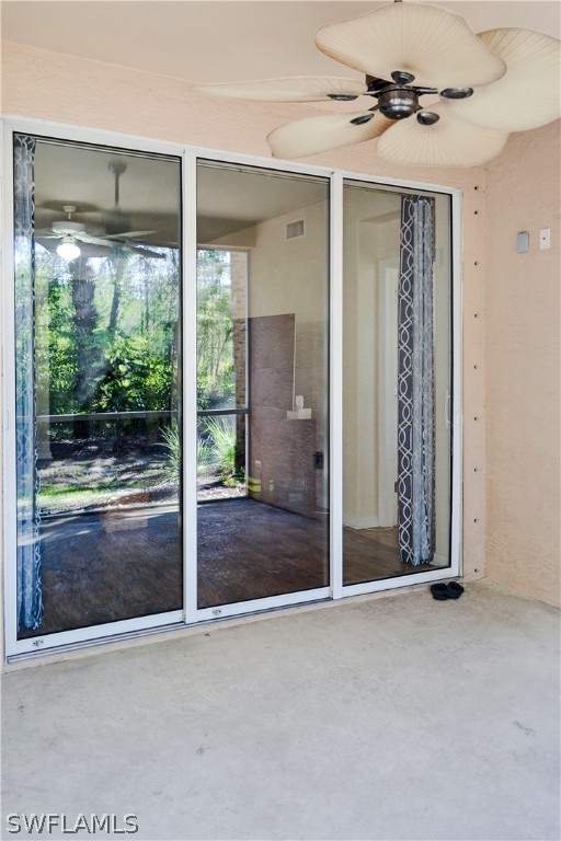 9048 Triangle Palms Lane, Unit 1106 Fort Myers, FL 33913 - Photo 24 of 29 a view of entryway with a garden