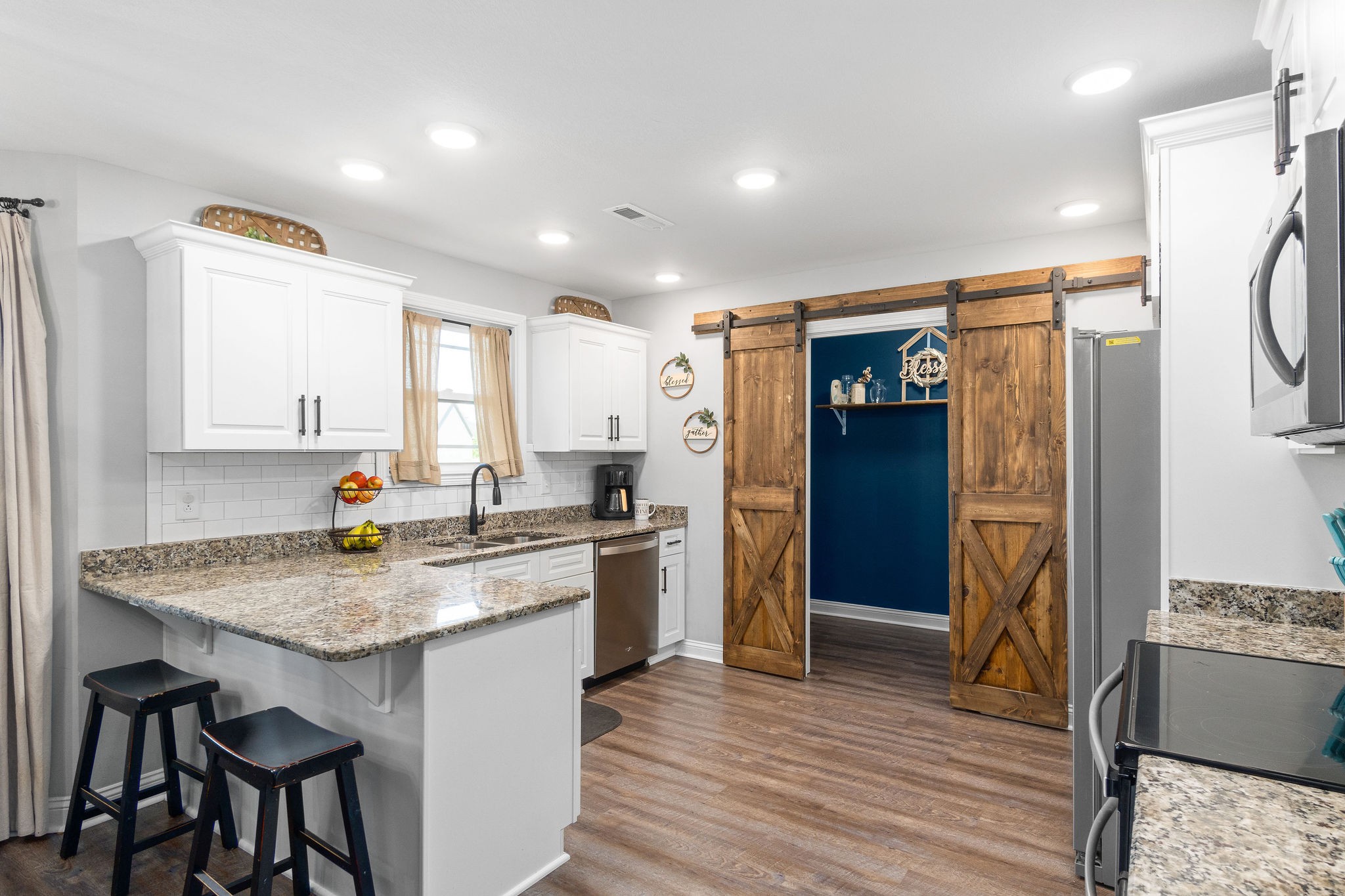1036 Rushmore Road Clarksville, TN 37042 - Photo 11 of 32 a kitchen with a sink stove and refrigerator
