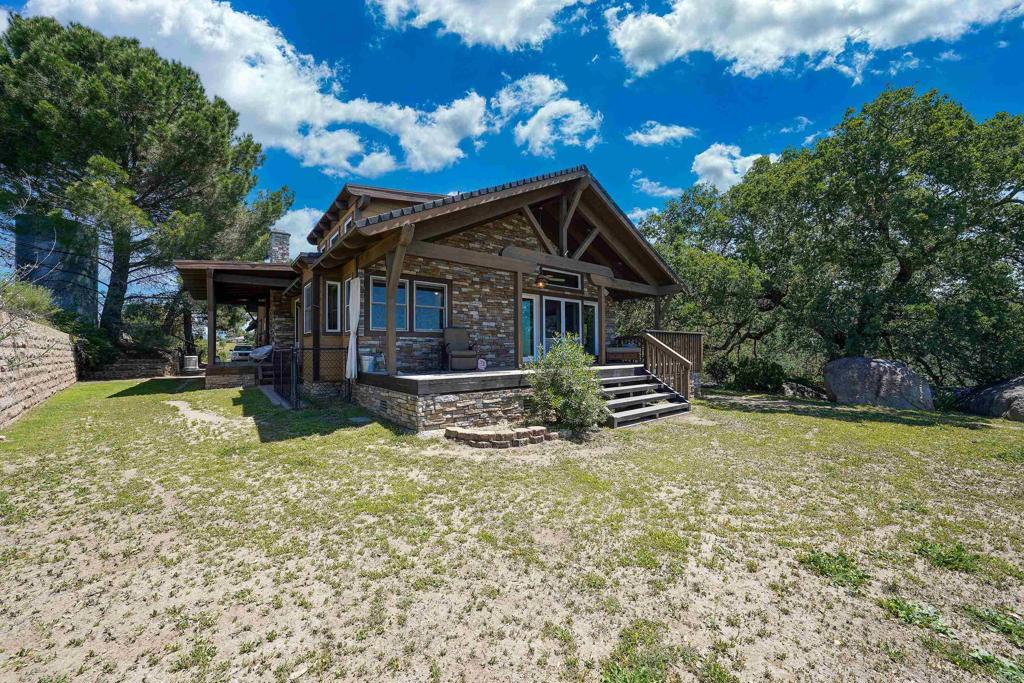 21057 Sutherland Dam Road Ramona, CA 92065 - Photo 15 of 66 a view of a house with a yard