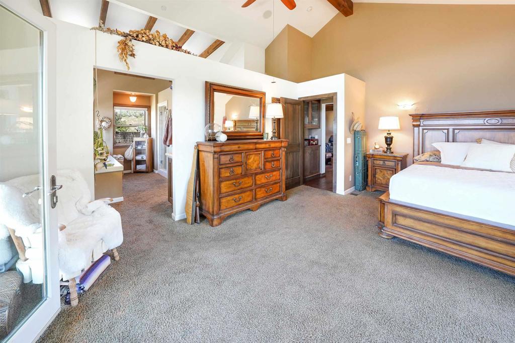 21057 Sutherland Dam Road Ramona, CA 92065 - Photo 37 of 66 a bed room with a bed and furniture