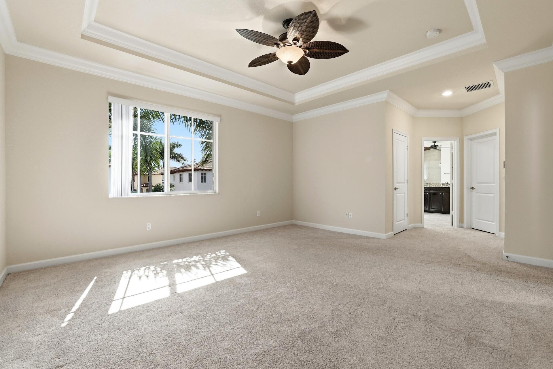 148 Northwest Emerson Place Boca Raton, FL 33432 - Photo 20 of 45 Primary Bedroom