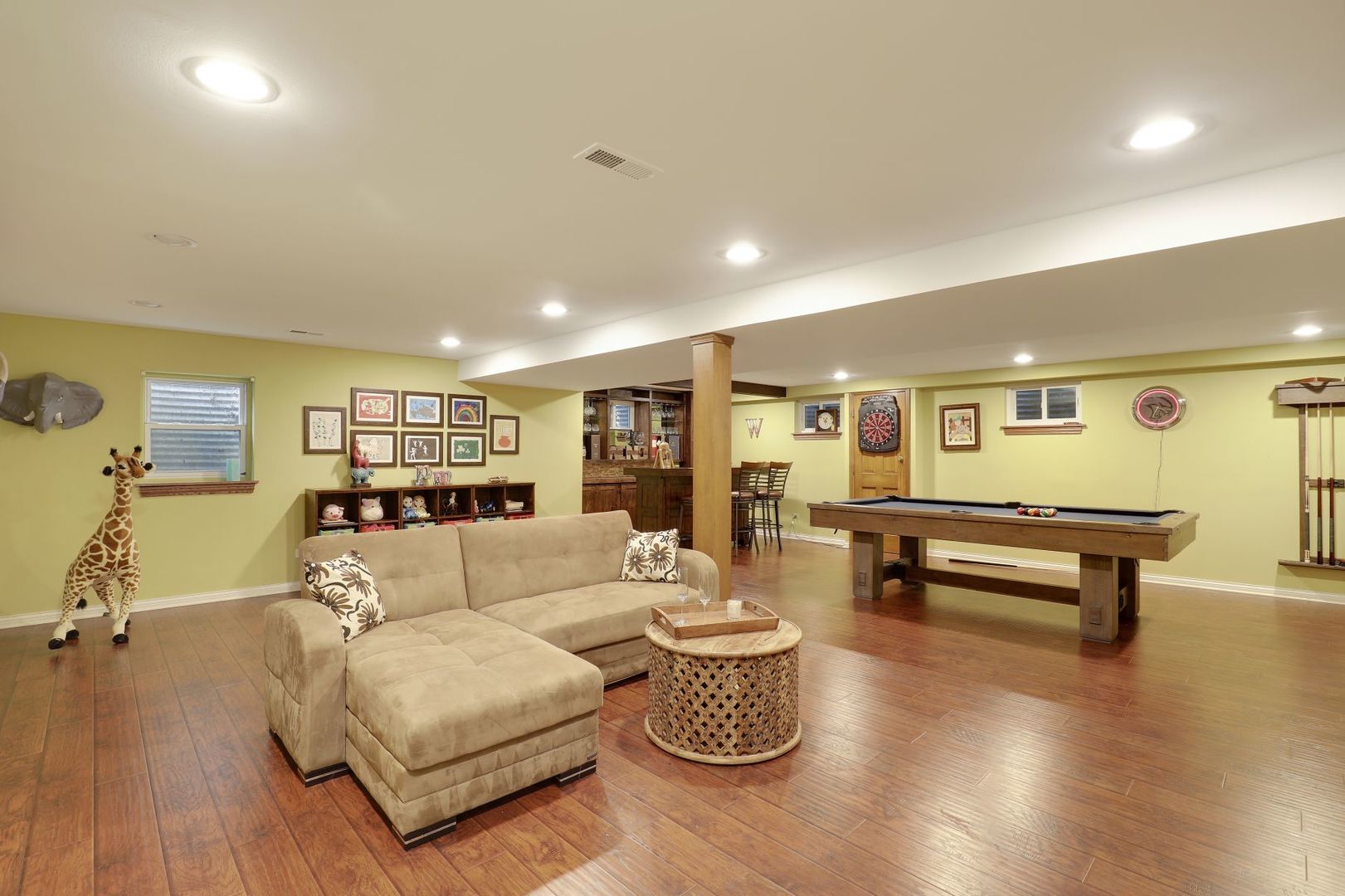 11400 Burr Oak Lane Burr Ridge, IL 60527 - Photo 16 of 40 a living room with furniture and a wooden floor