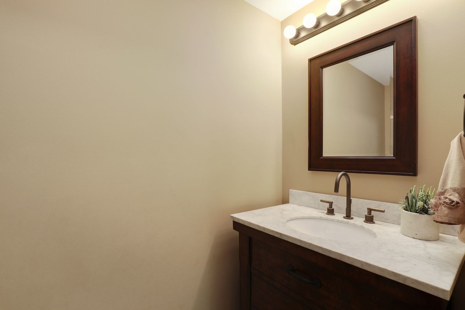 11400 Burr Oak Lane Burr Ridge, IL 60527 - Photo 31 of 40 a bathroom with a sink and a mirror