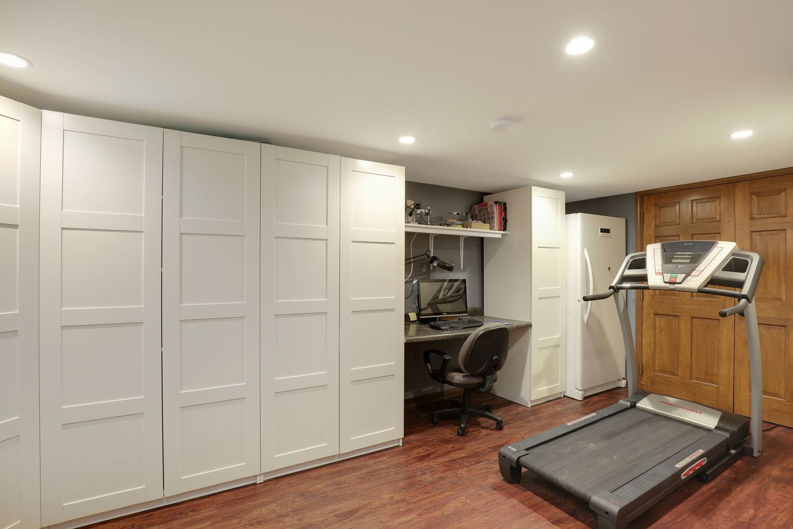 11400 Burr Oak Lane Burr Ridge, IL 60527 - Photo 33 of 40 a view of a room with gym equipment